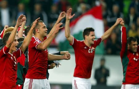 Hungary's players celebrate their victory against Faroe Islands in their Euro 2016 qualifying soccer match in Budapest, Hungary October 8, 2015. REUTERS/Laszlo Balogh