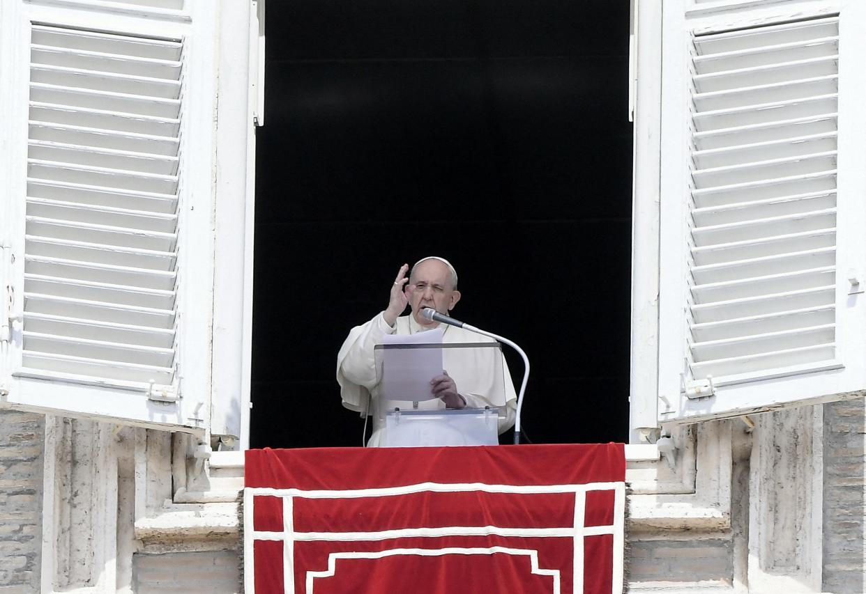 Pope Francis delivers his blessing from his studio's window overlooking Saint Peter's Square, at the Vatican on May 2, 2021.