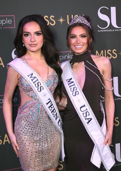 Former Miss Teen USA and Miss USA 2024 pose together wearing, gowns, tiaras and sashes