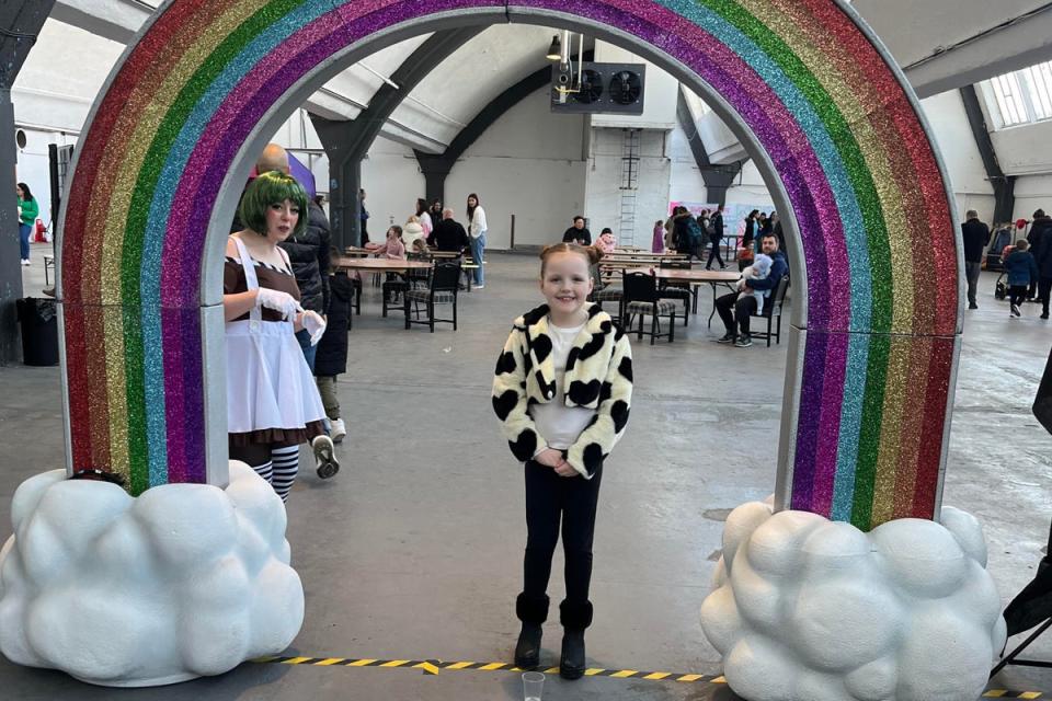 Maryanne Mccormack’s daughter Perri smiling under the makeshift rainbow and next to the hardworking Oompa Loompa (Maryanne Mccormack)