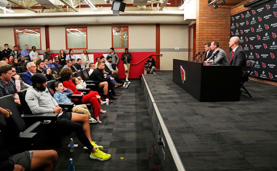 Quarterback Kyler Murray sits in the front row as Jonathan Gannon is introduced as the new head coach of the Arizona Cardinals during a news conference at the Cardinals training facility in Tempe on Feb. 16, 2023.