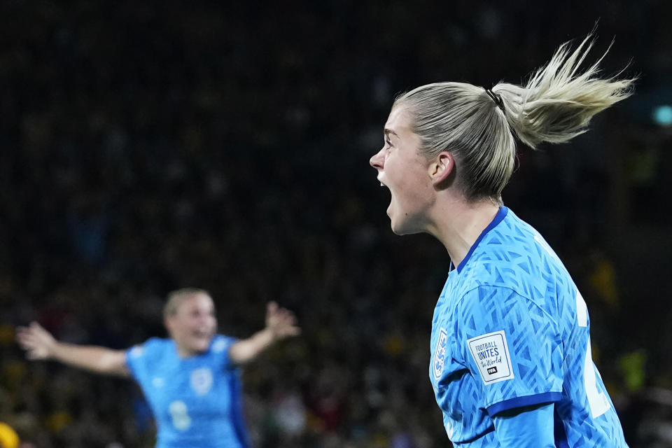 England's Alessia Russo celebrates after scoring her side's third goal during the Women's World Cup semifinal soccer match between Australia and England at Stadium Australia in Sydney, Australia, Wednesday, Aug. 16, 2023. (AP Photo/Abbie Parr)