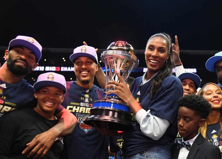 LOS ANGELES, CALIFORNIA - SEPTEMBER 01: Head coach Lisa Leslie, Jamario Moon and the Triplets celebrate with the trophy after defeating the Killer 3s to win the BIG3 Championship at Staples Center on September 01, 2019 in Los Angeles, California. (Photo by Harry How/BIG3 via Getty Images) ** OUTS - ELSENT, FPG, CM - OUTS * NM, PH, VA if sourced by CT, LA or MoD **