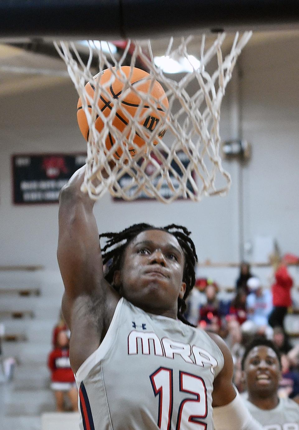 Madison-Ridgeland Academy's Josh Hubbard dunks for two against Parklane at MRA in Madison, Miss., Tuesday, Feb. 1, 2022.