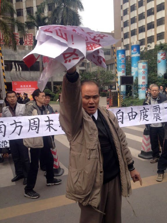 Demonstrators display banners and posters to support journalists from the Southern Weekend newspaper near the company's offices in Guangzhou on January 8, 2013. Protesters have mounted a second day of rallies calling for press freedom in China, as social media users and celebrities backed a campaign which poses a test for the nation's new leaders