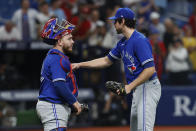 Toronto Blue Jays relief pitcher Jordan Romano, celebrates with catcher Alejandro Kirk after the Blue Jays defeated the Tampa Bay Rays in a baseball game Saturday, Sept. 24, 2022, in St. Petersburg, Fla. (AP Photo/Scott Audette)