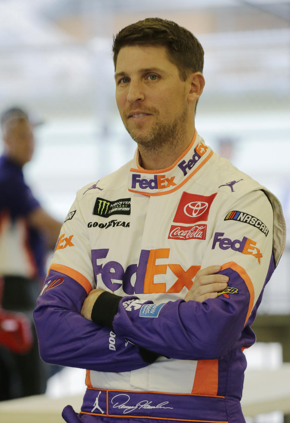 Denny Hamlin waits in the garage for a NASCAR Cup Series auto race practice to begin on Friday, Nov. 15, 2019, at Homestead-Miami Speedway in Homestead, Fla. Hamlin is one of four drivers racing for the series championship. (AP Photo/Terry Renna)