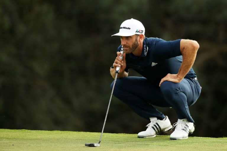 Dustin Johnson of the US lines up a putt on the 18th green during the final round of the Sentry Tournament of Champions, in Lahaina, Hawaii, on January 7, 2018