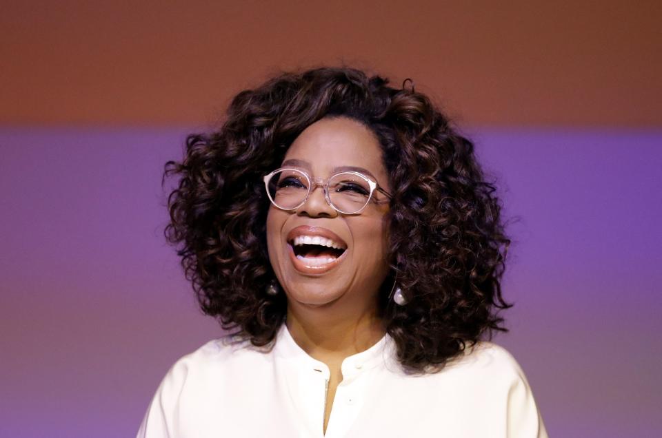 FILE - In this Nov. 29, 2018 file photo, Oprah Winfrey smiles during a tribute to Nelson Mandela and promoting gender equality event at University of Johannesburg in Soweto, South Africa. Winfrey began her career in the mid-1970s as a TV news anchor, moved on to host a talk show for decades and became a media executive and billionaire. Her ability to evolve and remain a force in American culture inspires Shari Coulter Ford, who's also had a long business career and now co-owns Tohi Ventures, maker of Tohi, a beverage sold online. (AP Photo/Themba Hadebe, File)