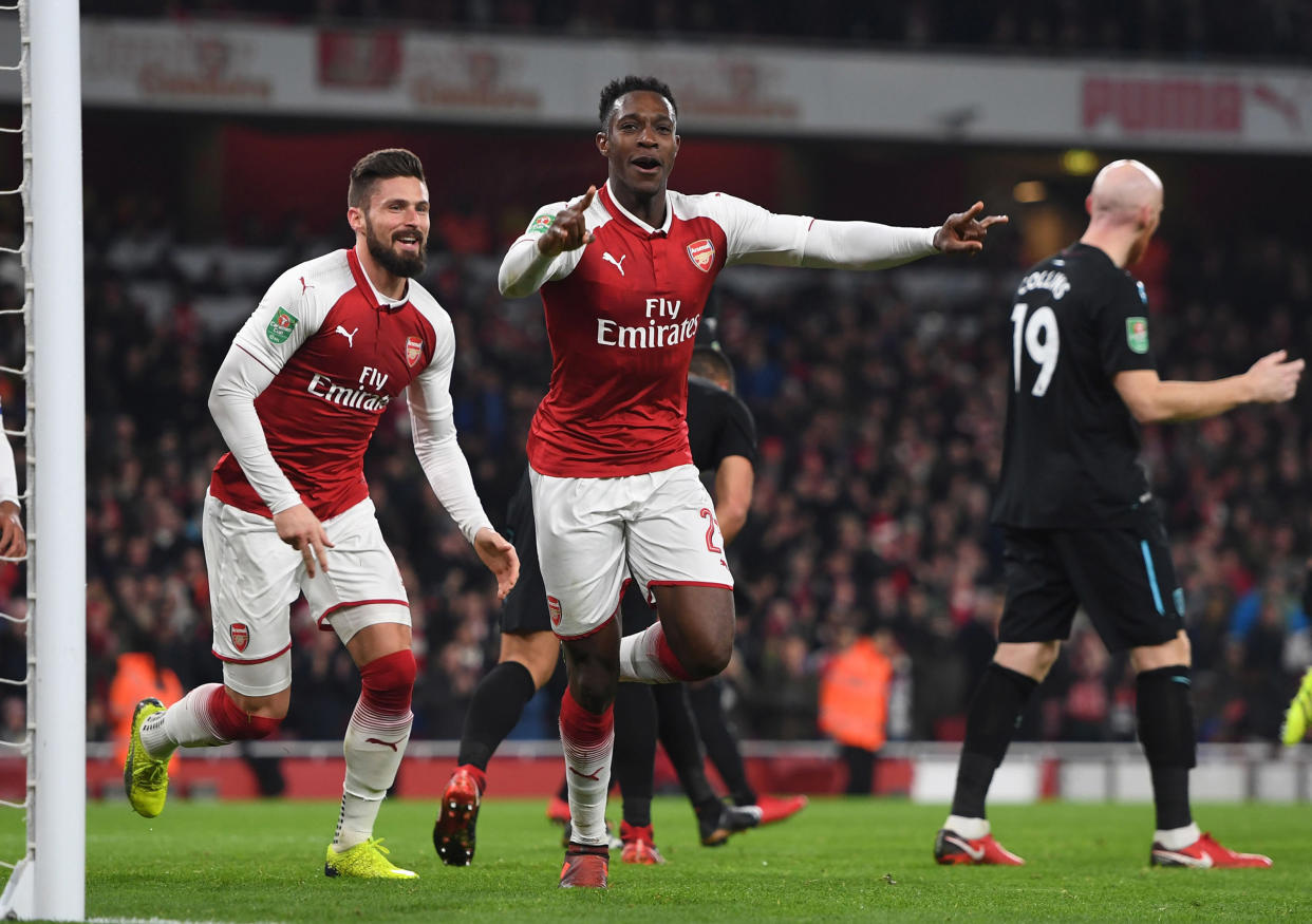 Danny Welbeck celebrates his goal for Arsenal against West Ham United in the League Cup quarterfinals. (Getty)