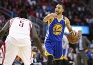 Jan 20, 2017; Houston, TX, USA; Golden State Warriors guard Stephen Curry (30) dribbles the ball during the third quarter against the Houston Rockets at Toyota Center. Mandatory Credit: Troy Taormina-USA TODAY Sports