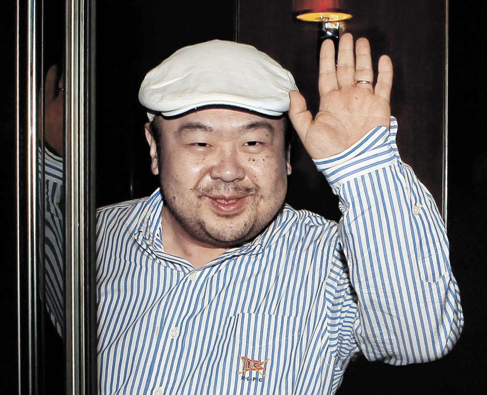 FILE - In this June 4, 2010, file photo, Kim Jong Nam, the eldest son of then North Korean leader Kim Jong Il, waves after his first-ever interview with South Korean media in Macau. The murder of North Korean leader Kim Jong Un’s estranged half-brother at an airport in Malaysia was brazen, intricately orchestrated and, thanks to scores of security cameras, witnessed by millions around the world. The real masterminds behind the killing, however, may never be brought to justice. (Shin In-seop/JoongAng Ilbo via AP, File)