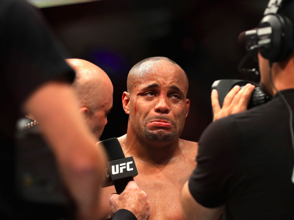 Daniel Cormier reacts while being interviewed after his loss to Jon Jones at UFC 214. (Getty)