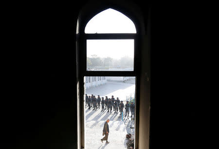 Afghan policemen inspect a Shi'ite Muslim mosque after yesterday's attack in Kabul, Afghanistan August 26, 2017.REUTERS/Mohammad Ismail