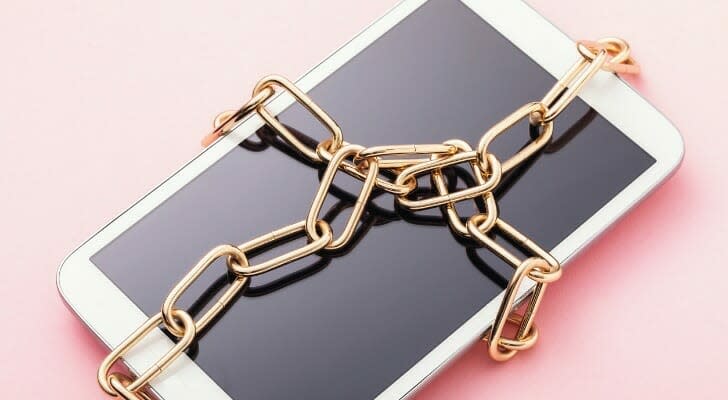 Digital tablet wrapped in a chain