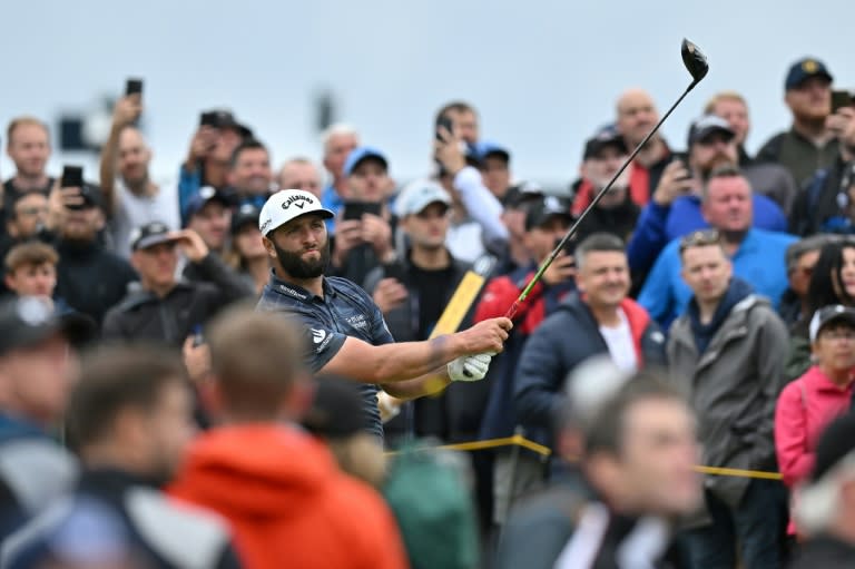 Spain's Jon Rahm hits a 63 at the British Open to roar into contention (Glyn KIRK)
