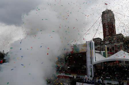 Confetti is shot in front of Taiwan's President Tsai Ing-wen's office building during the National Day celebrations in Taipei, Taiwan October 10, 2018. REUTERS/Tyrone Siu