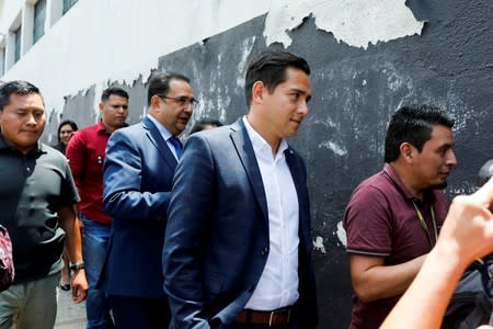 Son and brother of Guatemalan President Morales acquitted of corruption in Guatemala City