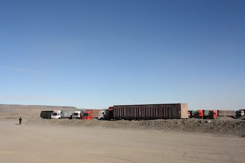 Trucks in Ömnögovi province waiting to fill up with coal shipments before driving down to the border with China - Credit: Meghan Davidson Ladly