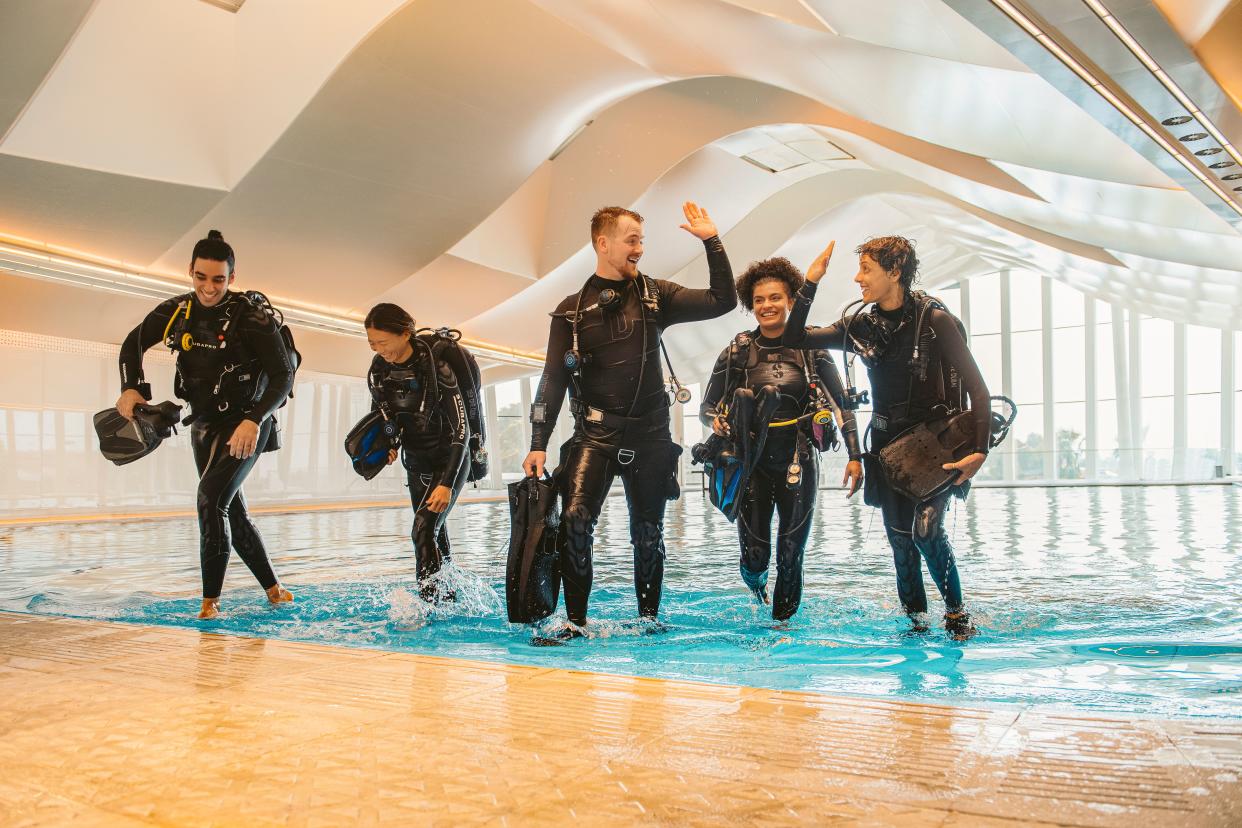 A team of divers exit the pool (Image: Deep Dive Dubai) 