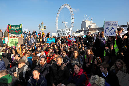 Environmental campaigners from the direct action group Rebellion demonstrate on Westminster Bridge in central London, Britain, November 17, 2018. REUTERS/Peter Nicholls