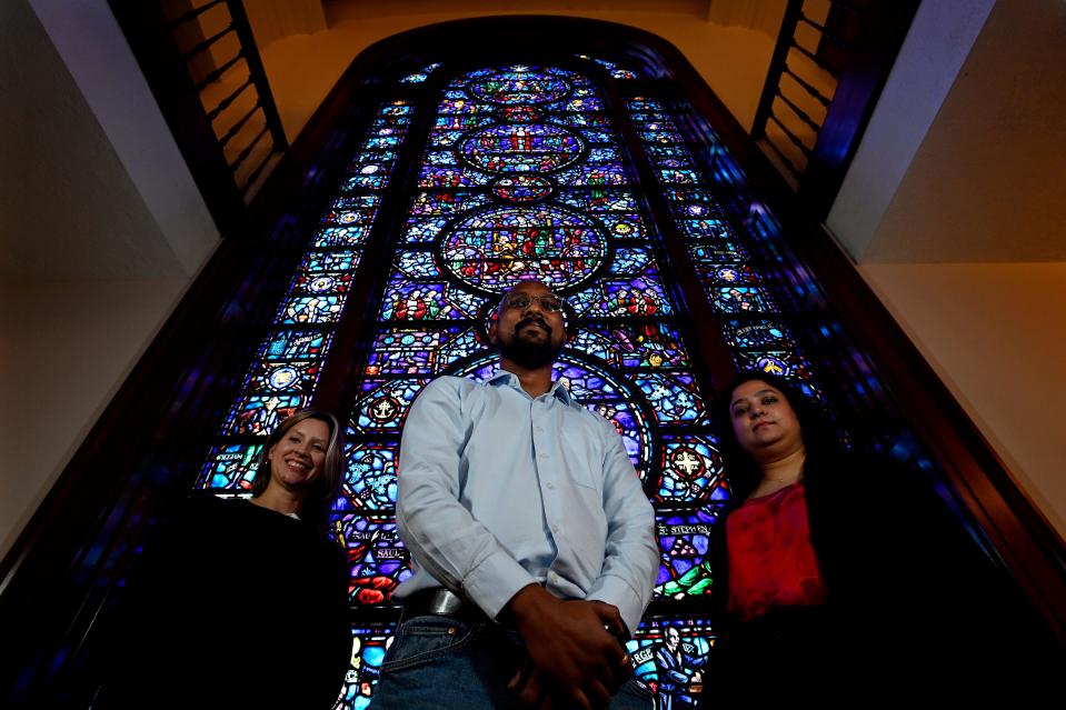 United Methodist Church administrative staff members Caitlin Congdon, left, Sandeep Kuntam, and Sharah Dass at the Upper Room Chapel Wednesday, April 3, 2024, in Nashville, Tenn. The UMC General Council on Finance and Administration has managed denomination finances and statistics during upheaval in the denomination due to a splintering that has caused 7,500-plus churches to leave.