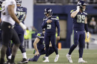 Seattle Seahawks' Jason Myers (5) holds his hand to his chest after kicking a 50-yard field goal against the New Orleans Saints during the second half of an NFL football game, Monday, Oct. 25, 2021, in Seattle. (AP Photo/John Froschauer)