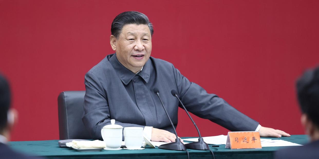 Chinese President Xi Jinping sits down during a visit to Renmin University of China in Beijing, capital of China, April 25, 2022.