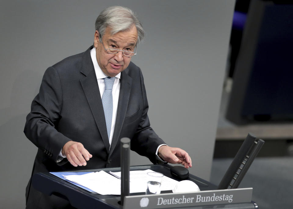 UN Secretary-General Antonio Guterres delivers a speech during a meeting of the German federal parliament, Bundestag, at the Reichstag building in Berlin, Germany, Friday, Dec. 18, 2020. (AP Photo/Michael Sohn)