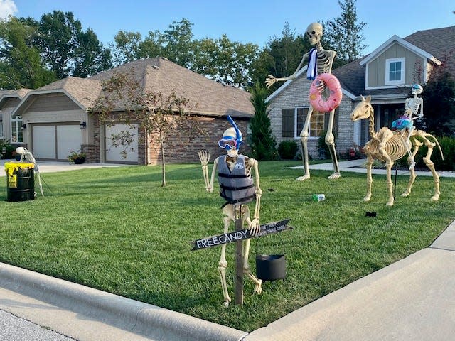 Skeletons appear ready for a pool party on a front lawn on Thorndale Drive in Nixa. According to Nixa homeowner Bailey Pyle, about 12 homeowners along Thorndale Drive scatter different skeleton characters on their front lawns for Halloween.