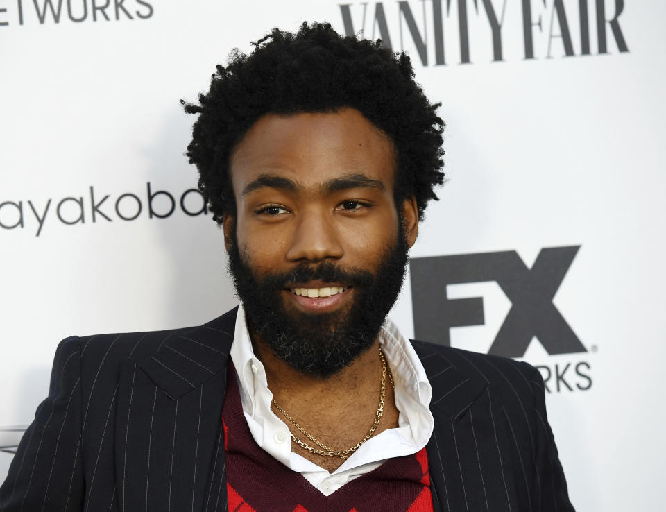 FILE - In this Sept. 16, 2018 file photo, Donald Glover, creator and star of the FX series "Atlanta," and a musician who performs under the name Childish Gambino, poses at a private cocktail party to celebrate the FX network's Emmy nominations in Los Angeles. Glover won four Grammy Awards on Sunday, Feb. 10, but did not attend the awards ceremony. (Photo by Chris Pizzello/Invision/AP, File)
