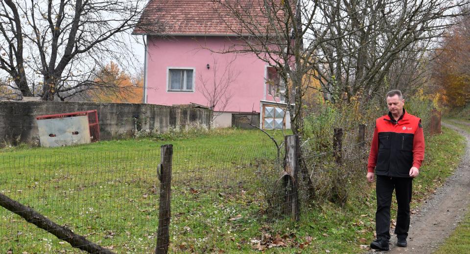 Bosnian Muslim, Fikret Bacic (59), whose wife and 2 children were executed in 1992 by Bosnian-Serb forces, walks past his former homestead in village of Zecovi, near Prijedor, in Northern Bosnia, on November 20, 2017.  Apart from his wife and children, 26 of Bacic's relatives were killed including his brother and his family. Fikret Bacic, to date, remains on a mission to find remains of his beloved ones. United Nations judges on November 22, 2017 sentenced former Bosnian Serbian commander Ratko Mladic to life imprisonment after finding him guilty of genocide and war crimes in the brutal Balkans conflicts over two decades ago.    / AFP PHOTO / ELVIS BARUKCIC        (Photo credit should read ELVIS BARUKCIC/AFP via Getty Images)