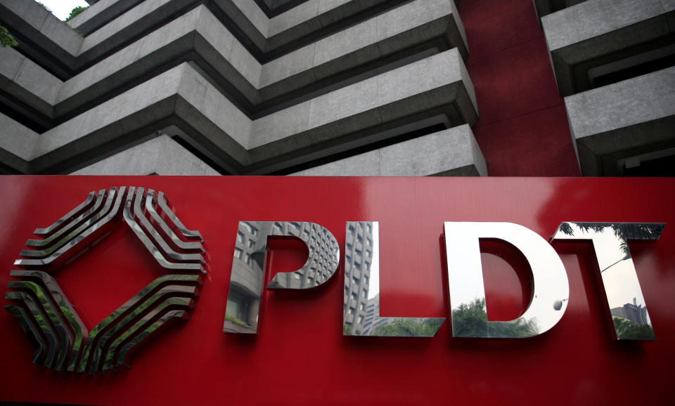 A logo of Philippine Long Distance Telephone Company (PLDT) is seen in front of their building in Makati city, metro Manila, Philippines May 30, 2016. REUTERS/Romeo Ranoco