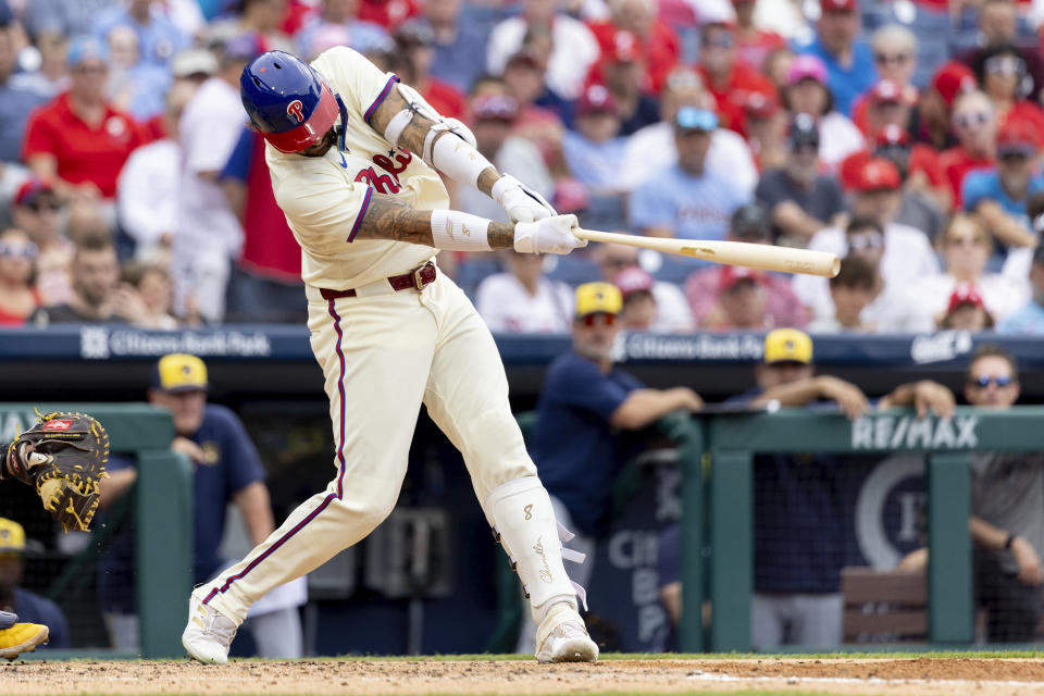 Philadelphia Phillies' Nick Castellanos hits a two-run home run during the sixth inning of a baseball game against the Milwaukee Brewers, Wednesday, June 5, 2024, in Philadelphia. (AP Photo/Laurence Kesterson)