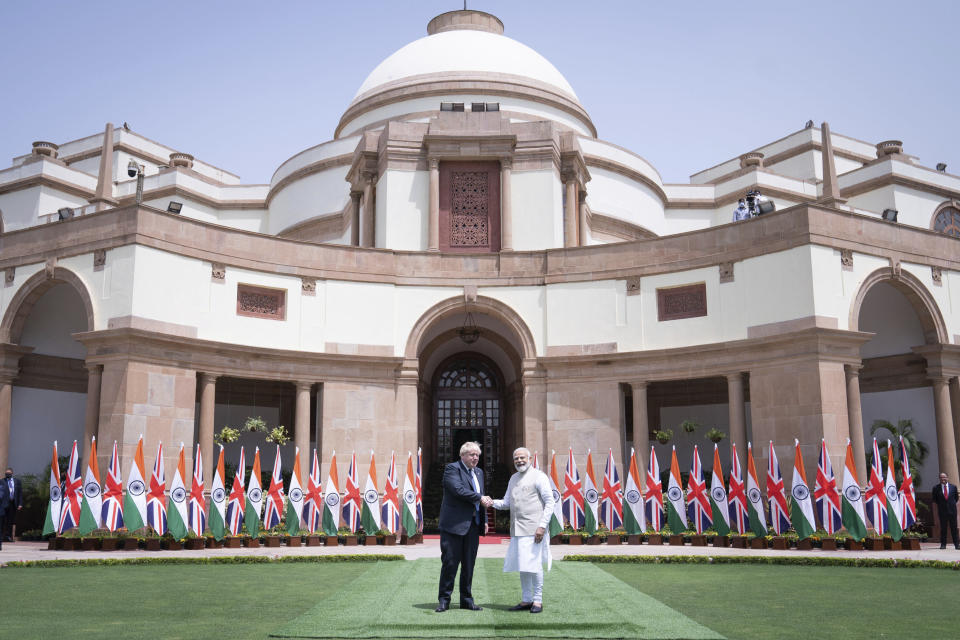 Britain's Prime Minister Boris Johnson with Prime Minister of India Narendra Modi at Hyderabad House in Delhi, as part of his two day trip to India, Friday, April 22, 2022. (Stefan Rousseau/Pool Photo via AP)