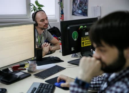 Specialists of IT company Infopulse are seen in their office in Kiev, Ukraine, June 13, 2017. Picture taken June 13, 2017. REUTERS/Gleb Garanich