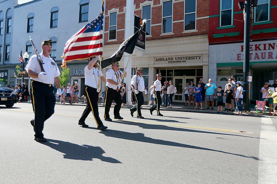 Ashland Honor Guard leads the Memorial Day parade down Main Street to the Ashland Cemetery on Monday, May 30, 2022. TOM E. PUSKAR/TIMES-GAZETTE.COM