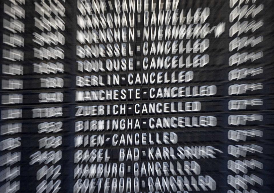 Cancelled flights are displayed on the flight board at the international airport in Frankfurt, Germany, Wednesday, July 27, 2022. Lufthansa went for a 24-hours-strike on Wednesday, most of the Lufthansa flights had to be cancelled. (AP Photo/Michael Probst)