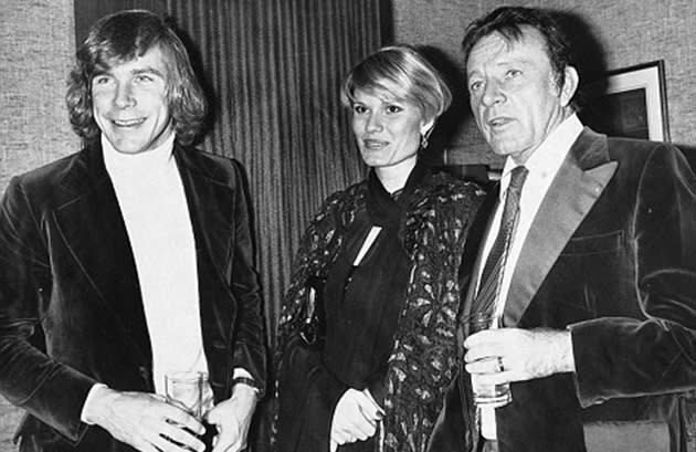 Caught between two men: James Hunt, Suzy Miller, and Richard Burton in 1976