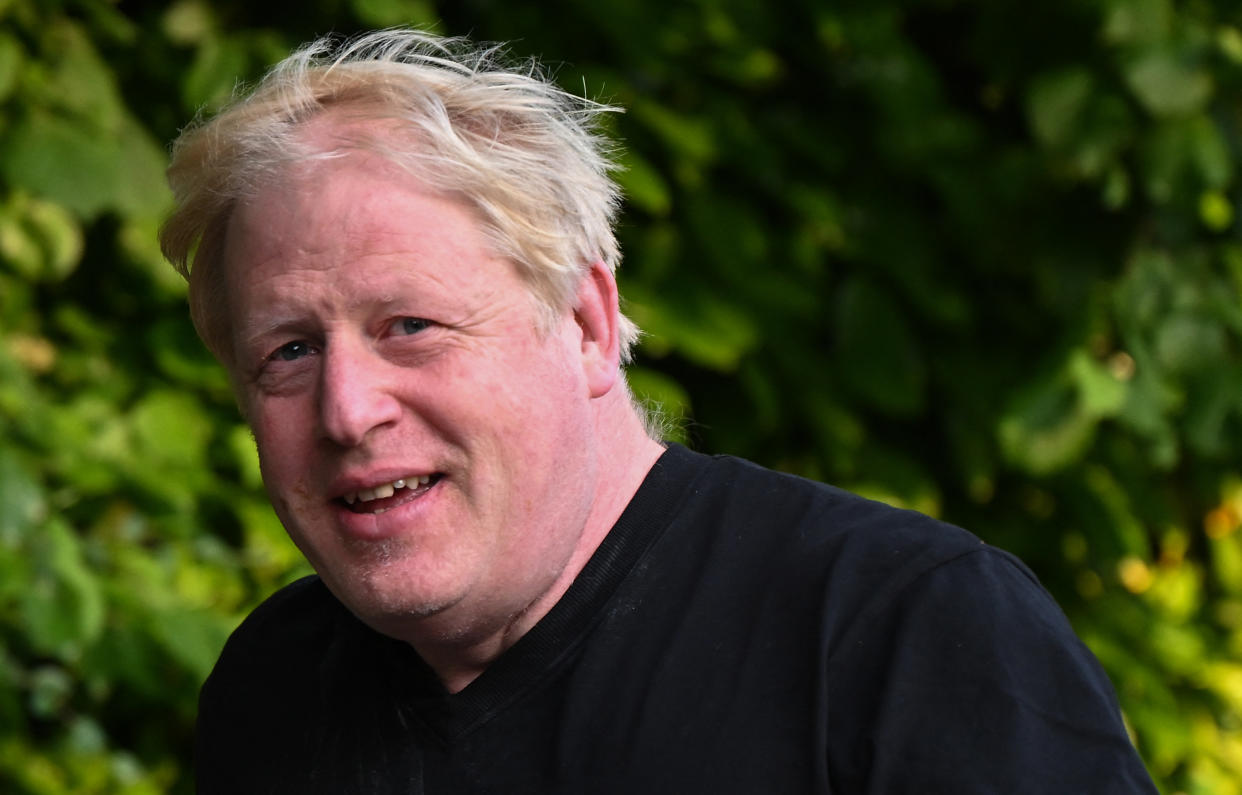 Former British Prime Minister Boris Johnson leaves his house for a run in Brightwell-cum-Stowell, west of London on June 14, 2023. (Photo by JUSTIN TALLIS / AFP) (Photo by JUSTIN TALLIS/AFP via Getty Images)