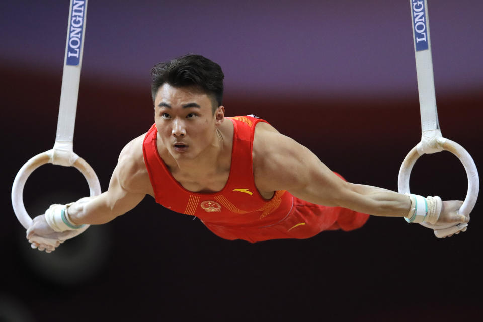 China's Xiao Ruoteng performs on the rings during the Men's All-Around Final of the Gymnastics World Chamionships at the Aspire Dome in Doha, Qatar, Wednesday, Oct. 31, 2018. (AP Photo/Vadim Ghirda)