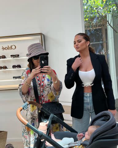 <p>Chrissy Teigen/Instagram</p> Teigen poked fun at her mom's outfit on a shopping trip