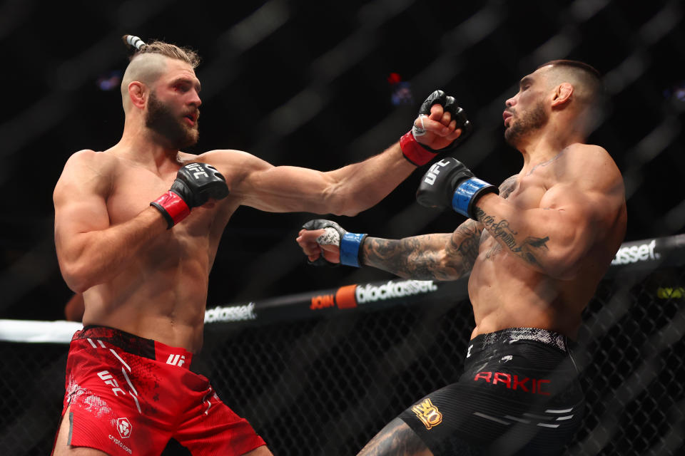 Apr 13, 2024; Las Vegas, Nevada, USA; Jiri Prochazka (red gloves) fights Aleksandar Rakic (blue gloves) during UFC 300 at T-Mobile Arena. Mandatory Credit: Mark J. Rebilas-USA TODAY Sports