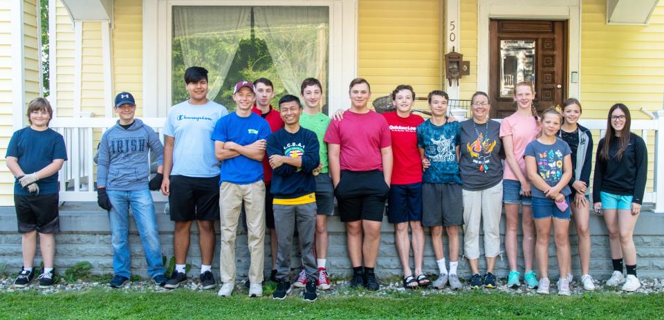 Volunteers from Knights of Columbus Council 2900 and Columbian Squires from St. Charles Borromeo Catholic Church helped with projects at Tommy's House.