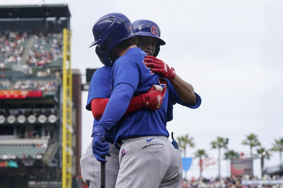 Chicago Cubs' Christopher Morel, rear, is congratulated by Dansby Swanson after hitting a home run against the San Francisco Giants during the fourth inning of a baseball game in San Francisco, Saturday, June 10, 2023. (AP Photo/Jeff Chiu)