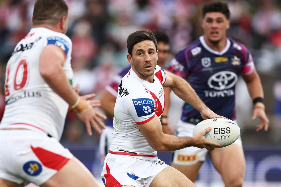 Seen here, Dragons halfback Ben Hunt passing the footy during the round 20 match against the North Queensland Cowboys. 