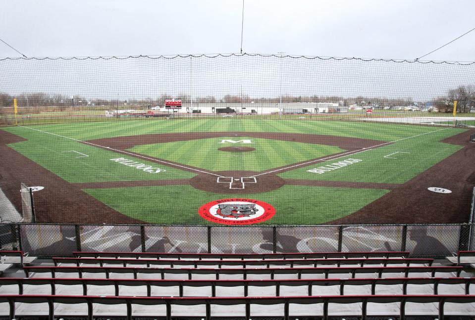 The new playing surface, fence and scoreboard are shown at Thurman Munson Memorial Stadium on Saturday, March 26, 2022.