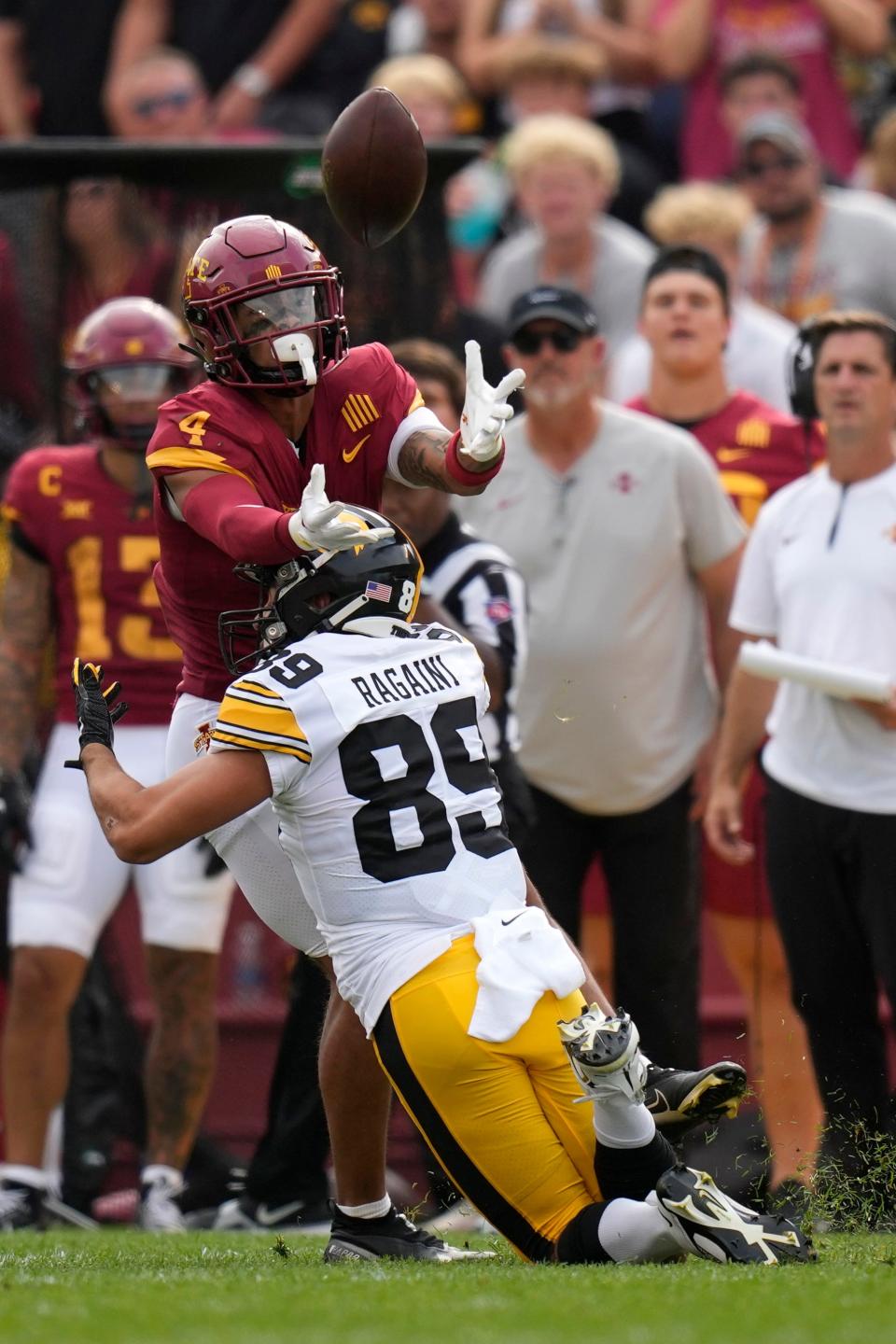 Iowa State defensive back Jeremiah Cooper (4) intercepts a pass intended for Iowa wide receiver Nico Ragaini (89). Cooper has posted three total interceptions through the first two games of the 2023 season.