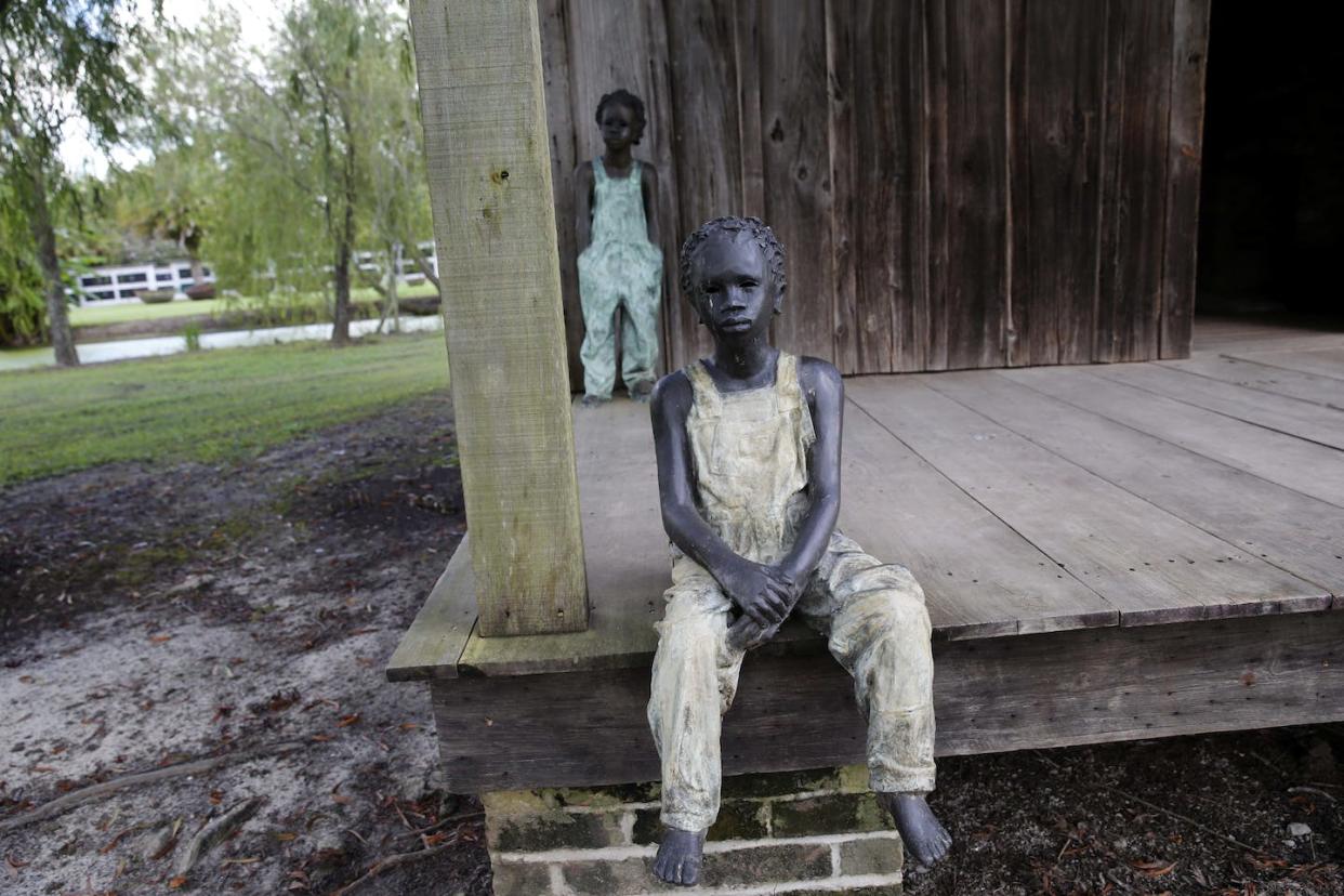 These statues of enslaved young boys are part of a modern-day depiction of southern plantation life at the Whitney Museum in Louisiana. <a href="https://newsroom.ap.org/detail/ConfederateMonumentProtestDividedHistory/42d22e7fb72646ec9915dfb050b804aa/photo?Query=whitney%20plantation&mediaType=photo&sortBy=arrivaldatetime:desc&dateRange=Anytime&totalCount=36&currentItemNo=5" rel="nofollow noopener" target="_blank" data-ylk="slk:AP Photo/Gerald Herbert;elm:context_link;itc:0;sec:content-canvas" class="link ">AP Photo/Gerald Herbert</a>