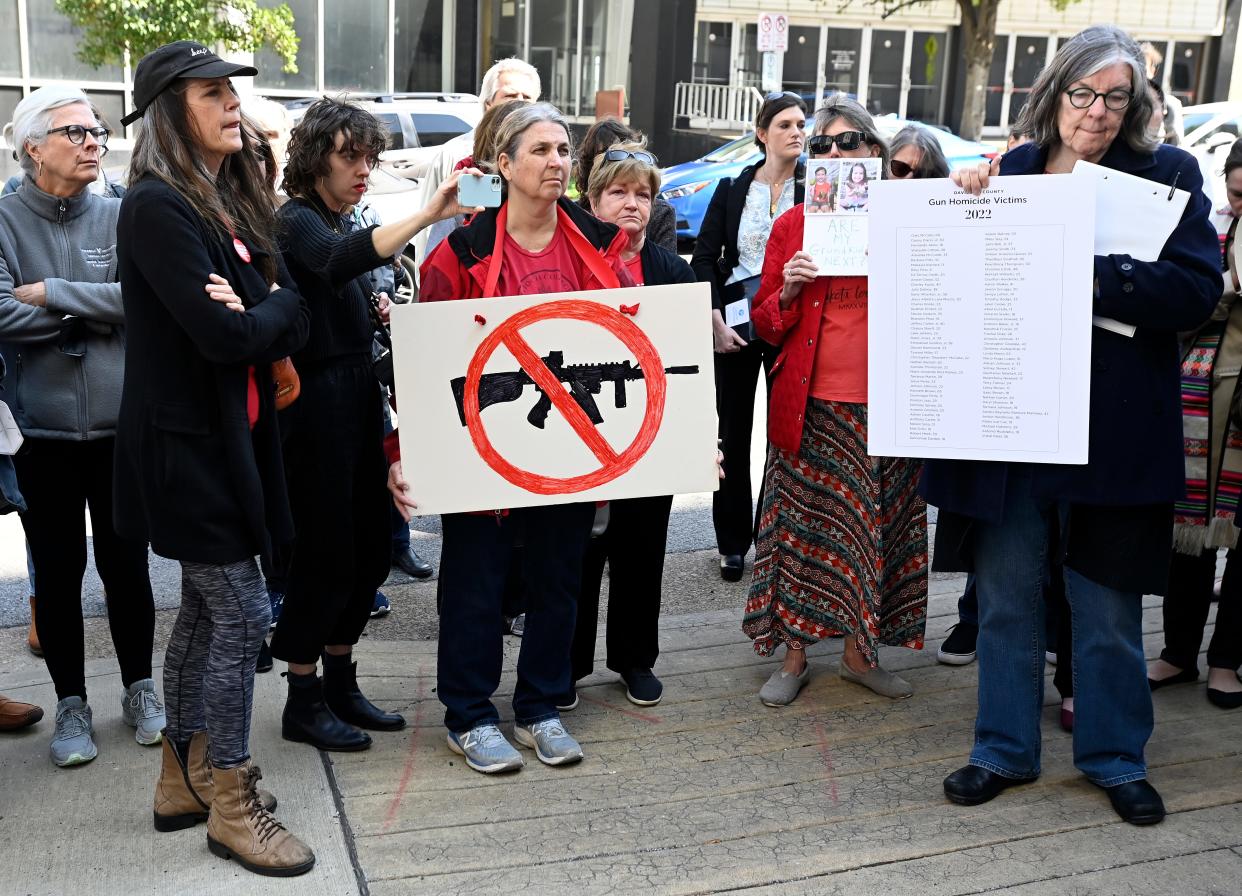 Demonstrators protest against gun violence in front of the Cordell Hull Building Tuesday, March 28, 2023, in Nashville, Tenn., after mass shooting Monday at Covenant School.